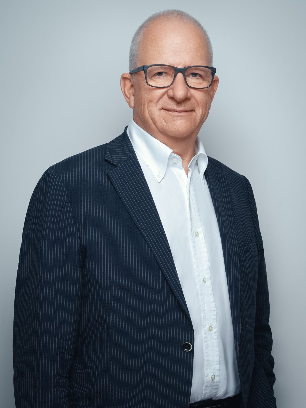 Business portrait before and after retouching