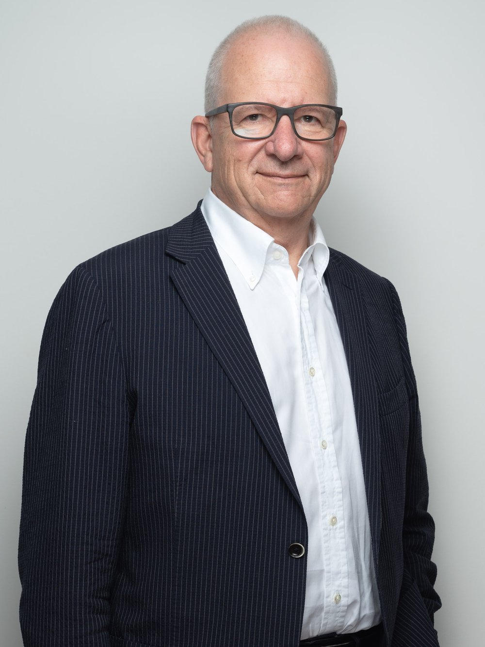 Business portrait before and after retouching